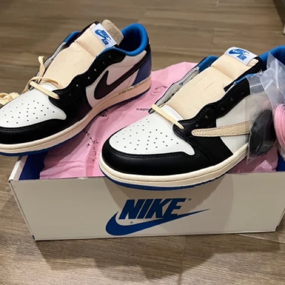 Nike Black and Cream Sneakers with Blue Accents